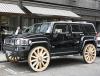 Показан Hummer с деревянными колесами