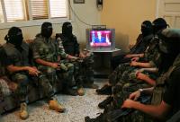 Палестинцы смотрят выступление Обамы