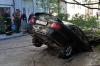 В Петербурге автомобиль засосало в воронку с водой