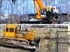 Бульдозер и кран упали в шахту шлюза под Нижним Новгородом